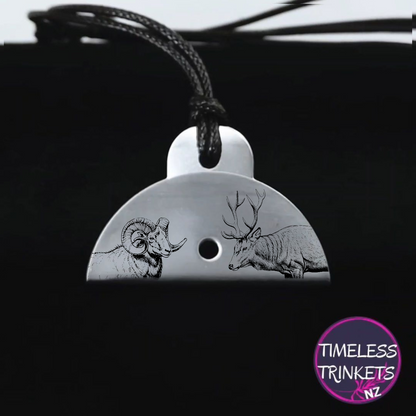 Stainless steel shepherds whistle with engraved images of a ram and a deer