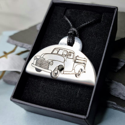 Stainless steel shepherds whistle
with a vintage truck design in a black box