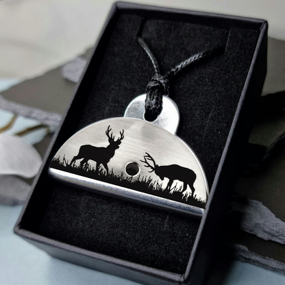 Stainless steel shepherds whistle
necklace with deer pendant in a black  gift box