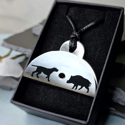 Stainless steel shepherds whistle
with dog and bear engraved silhouettes in a black box
